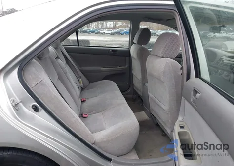 2003 Toyota Camry Le z USA, uszkodzony, nr VIN 4T1BE32K73U140341